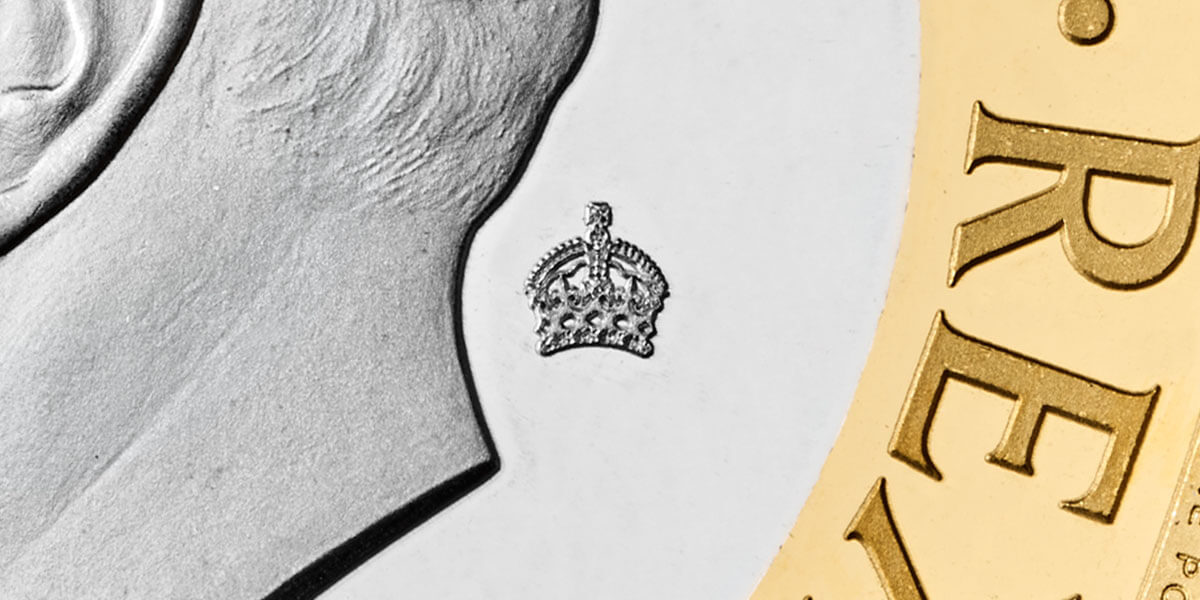 A close up of the 2023 Definitive £2 that highlights a privy mak that features on the coins