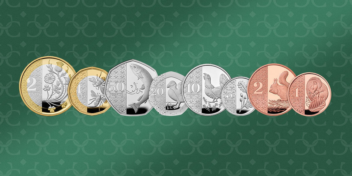 The full 2023 UK Definitive coin collection side by side with the reverse flora and fauna designs on display.