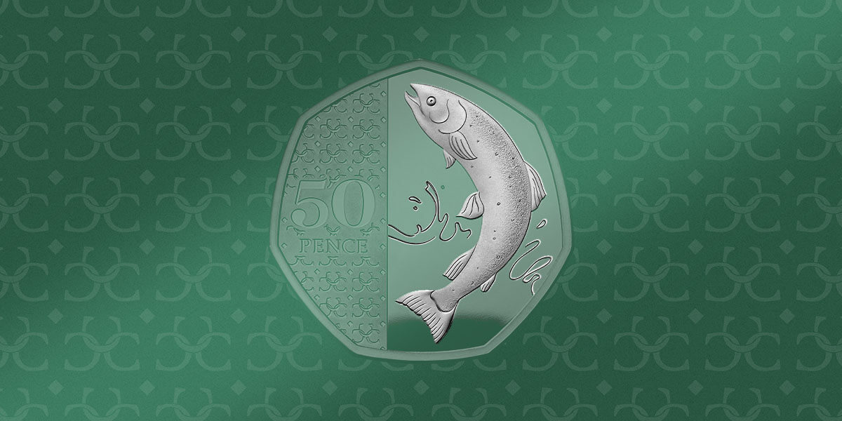 The 2023 Definitive 50p with a design featuring the Atlantic Salmon with a green tint against a dark green background